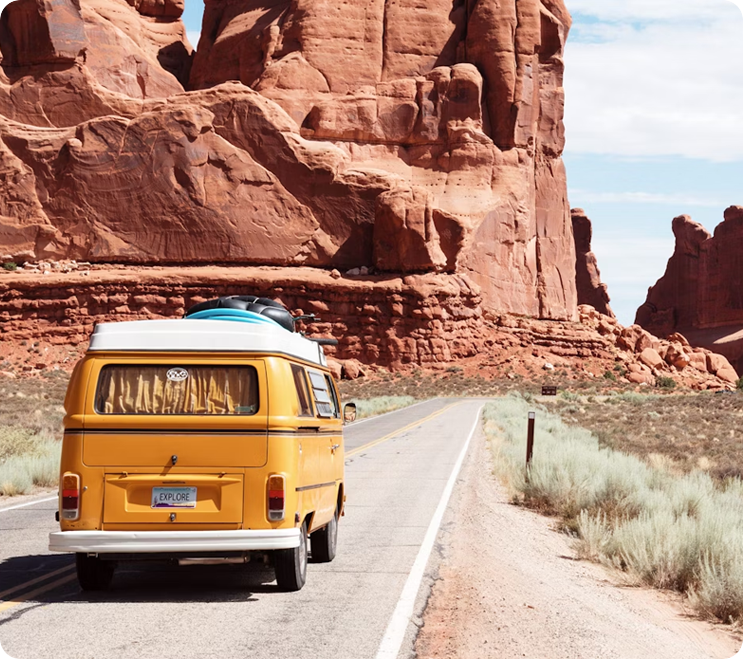 Yellow van on desert road